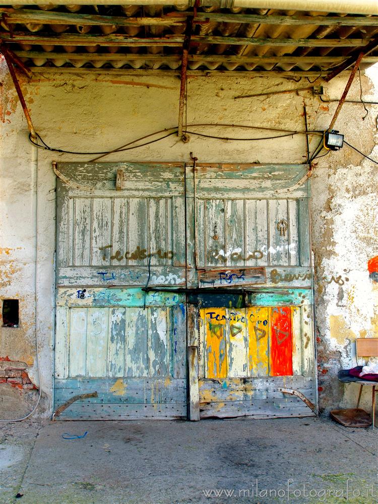 Milan (Italy) - Old door in a farmhouse in Assiano, one of the Milan villages